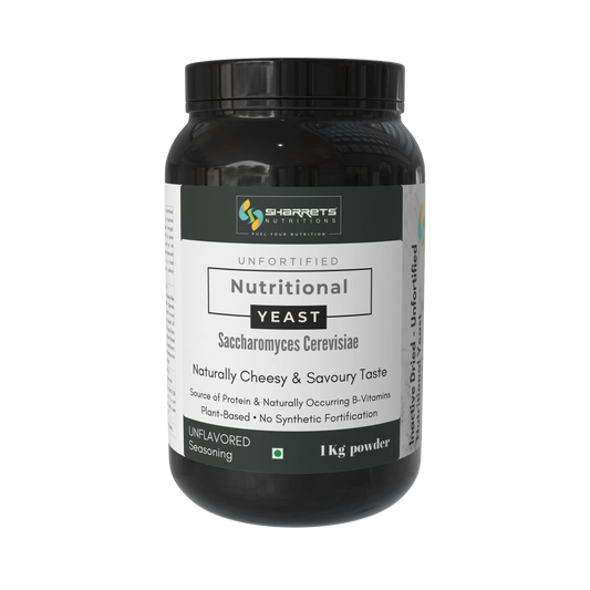 Black container of nutritional yeast with Sharretts Nutritions label on a white background