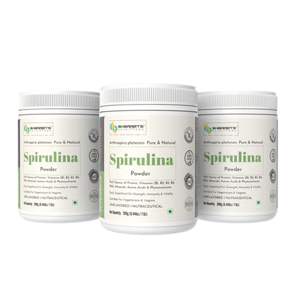 Three containers of Sharrets Spirulina Powder on a white background