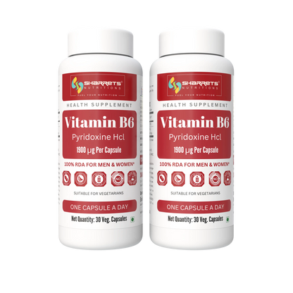 Two white bottles of Sharrets Nutritions Vitamin B6 Pyridoxine Hcl health supplement, side by side on a plain white background.