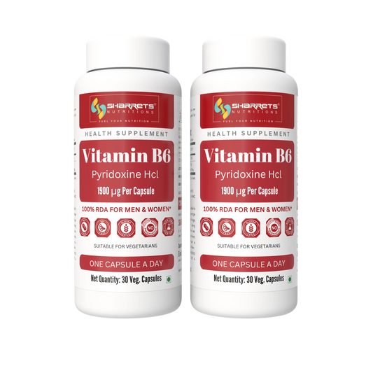 Two white bottles of Sharrets Nutritions Vitamin B6 Pyridoxine Hcl health supplement, side by side on a plain white background.
