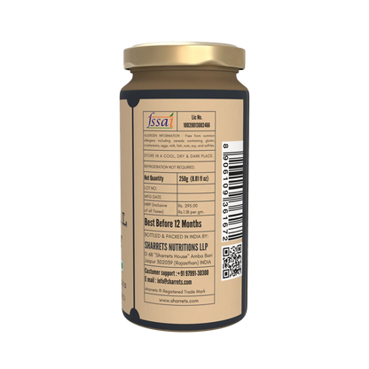 Back view of a jar with a gold lid and label on a white background - sharrets honey