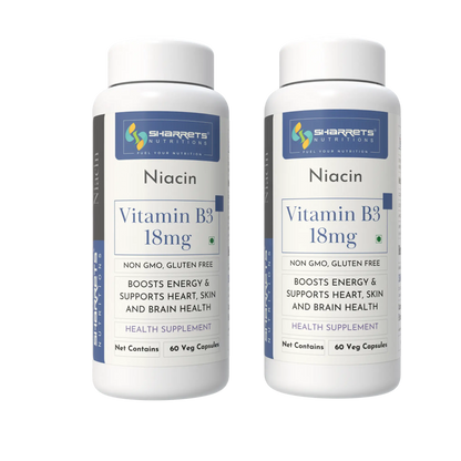 Two bottles of Sharrets Niacin Vitamin B3 18mg supplements on a white background
