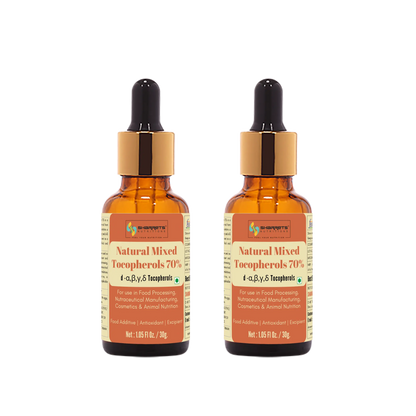 Two bottles of Natural Mixed Tocopherols 70% on a white background
