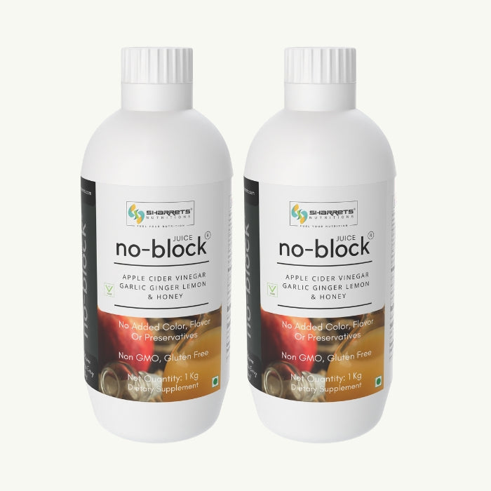 Two bottles of 'no-block' juice on a white background