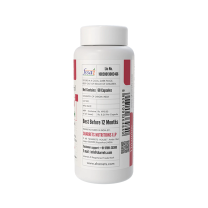 White supplement bottle with red label on a white background