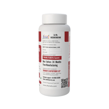 A white plastic bottle of Sharrets  Nutritions  vitamin b6 capsules with a white cap, featuring a white label with red and black text and details.
